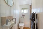 The shower-room is light, bright and stylish.