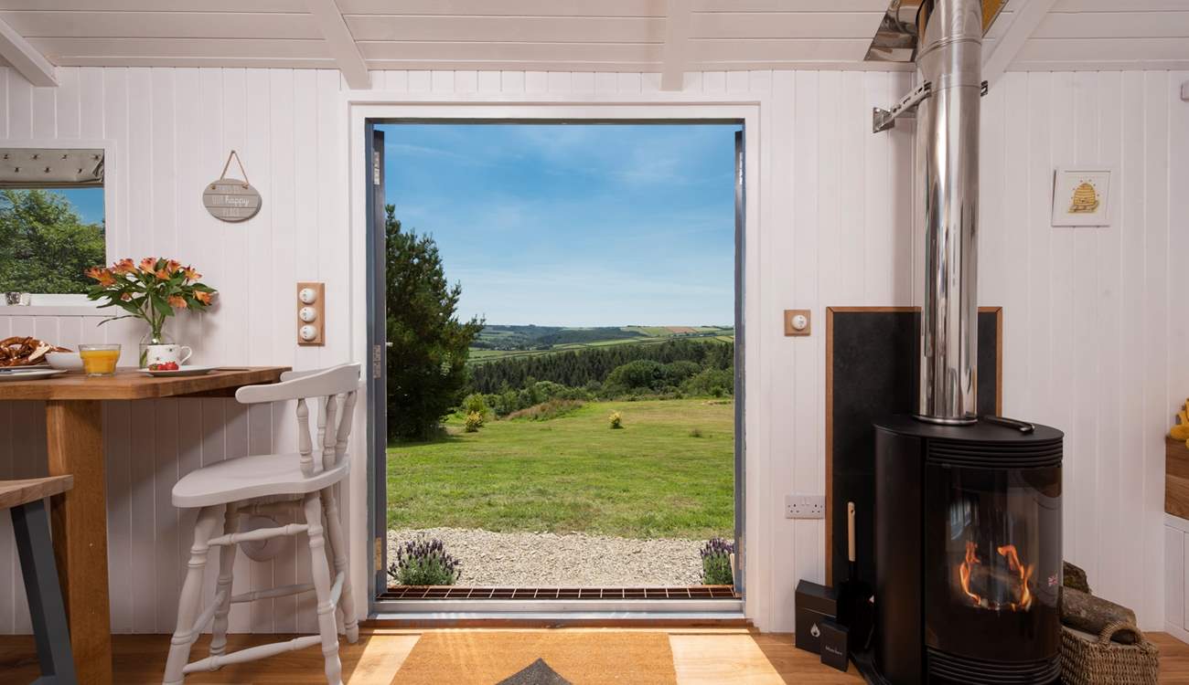 Just look at that gorgeous view! And there's a cosy wood-burner too - perfect for out-of-season breaks.