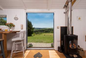 Just look at that gorgeous view! And there's a cosy wood-burner too - perfect for out-of-season breaks.