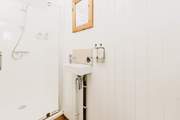 There is a serene ensuite shower room with WC