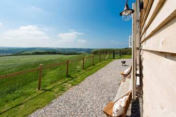 The jaw-dropping panoramic view looks down over farmland and forest to the River Torridge, over countryside miles beyond and as far as Lundy Island just off the coast.