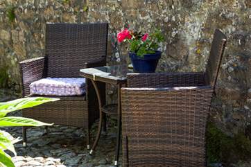 This secluded little seating area is the perfect spot to relax and listen to the morning bird song.
