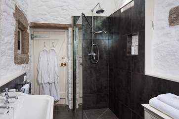 There is a super walk-in shower and you have bath robes provided for your use too!