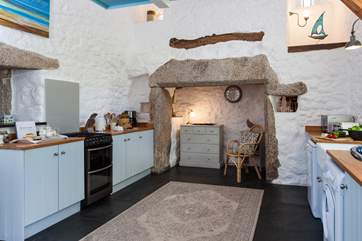 The super kitchen is well-equipped and has ample storage space.