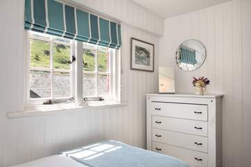 The twin bedroom overlooks the courtyard garden.