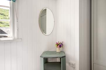 There is a lovely mix of furniture throughout that perfectly complements the apartment.