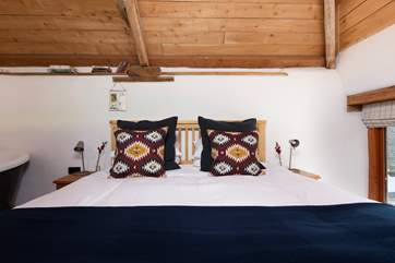 A sumptuous super-king double bed to rest your heads on.