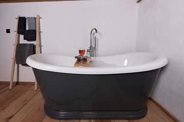 Sit back and relax in the roll-top bath - glass of wine and book on-hand, of course.