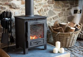 The warming wood-burner ensures year-round cosiness and adds a lovely atmosphere to out-of-season breaks.