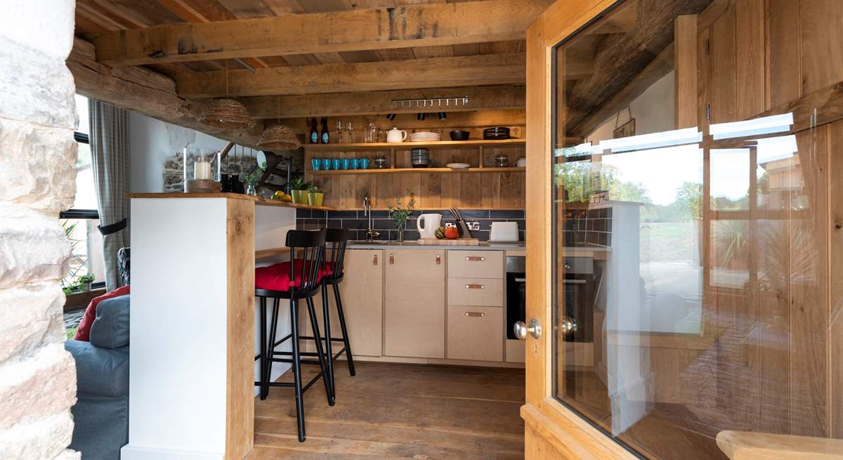 The open plan kitchen sits just behind the living space. 