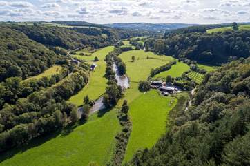 What an amazing location! Hatherland Mill Farm is shown here towards the middle of the shot - Swallow's Nest's courtyard backs onto the meadow in the foreground.