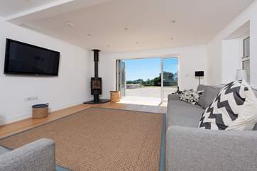 The sitting-room is vast with amazing views and stylish (but comfortable) furnishings.