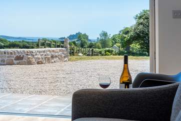 French doors open into the south-facing courtyard. Make the most of the view of St Michael's Mount.