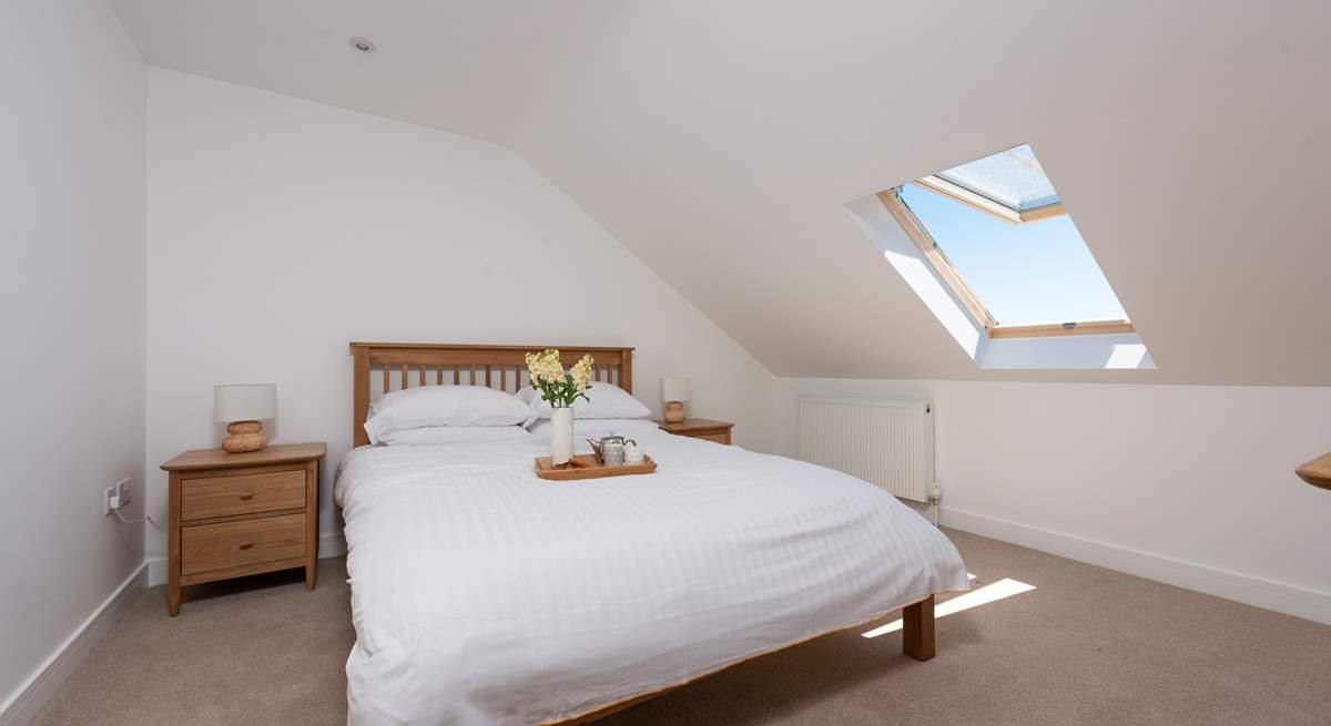 A king-size bed in this second bedroom with a (fabulous) view.