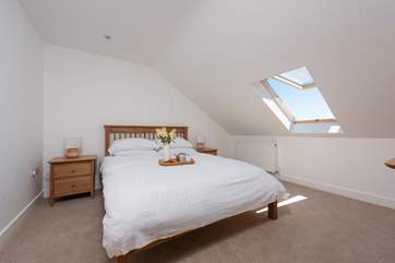 A king-size bed in this second bedroom with a (fabulous) view.