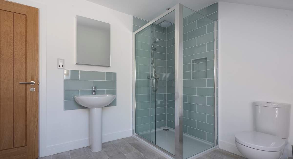 The shower in the family bathroom on the first floor.