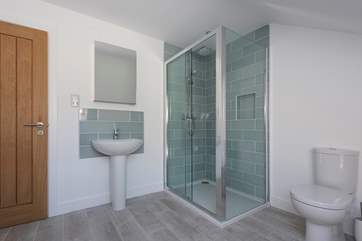 The shower in the family bathroom on the first floor.
