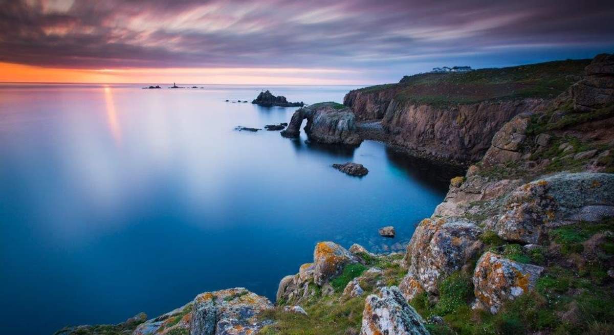 Sun sets over Land's End.