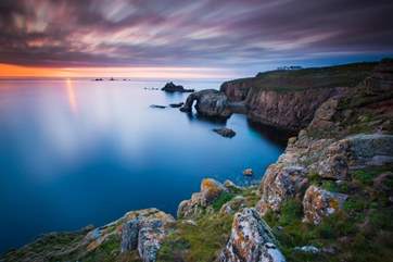 Sun sets over Land's End.