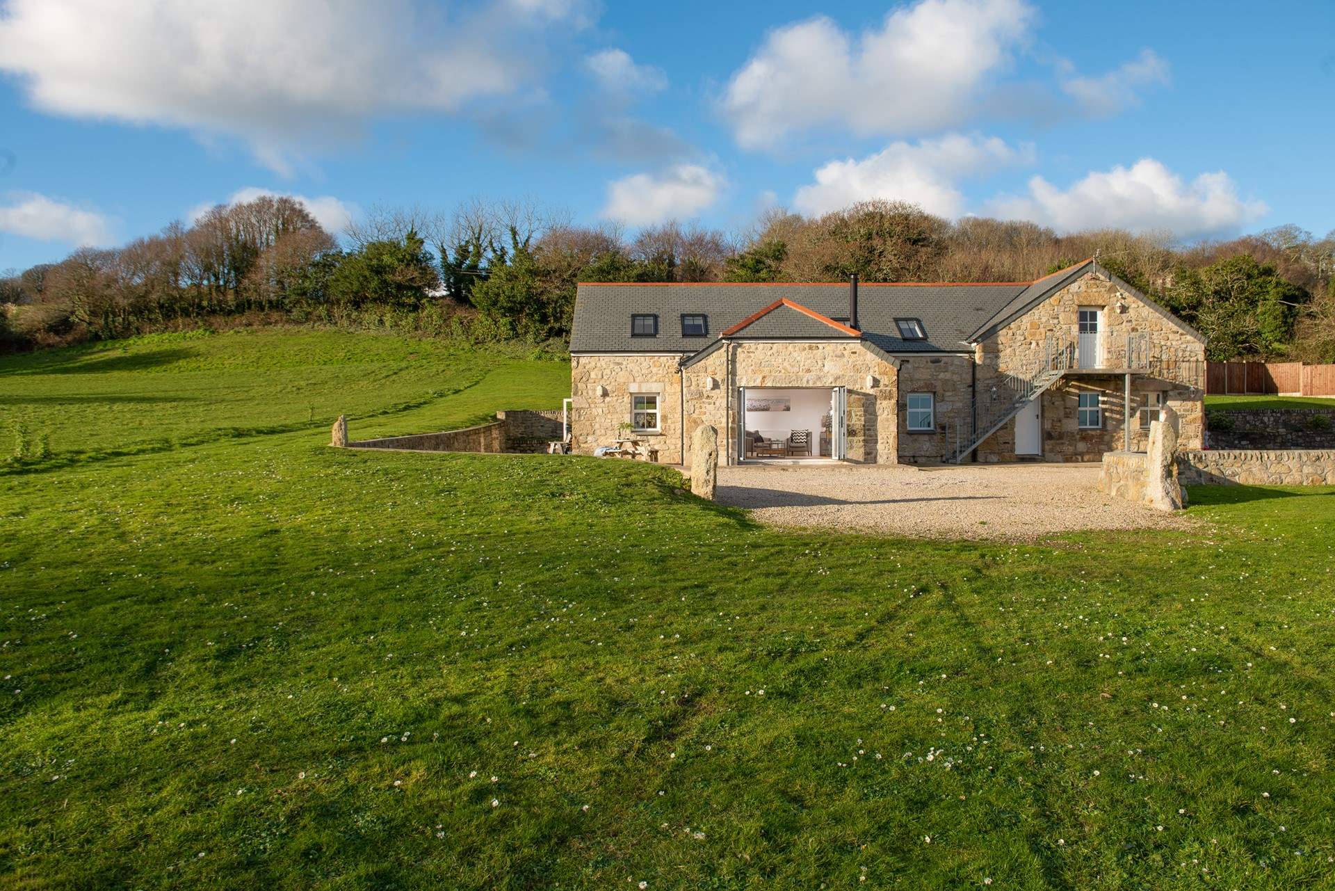 At Tolver Spring, the sitting-room doors open to welcome the countryside in.