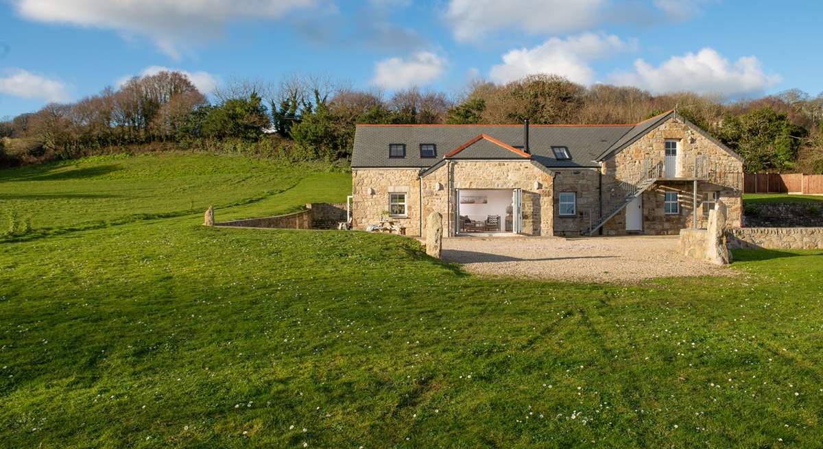 At Tolver Spring, the sitting-room doors open to welcome the countryside in.