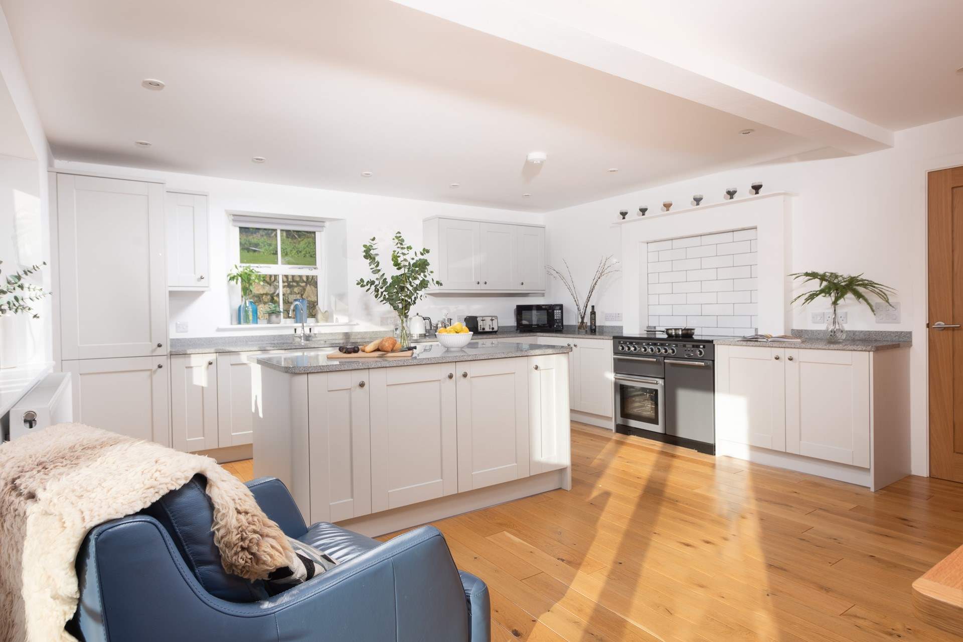 The lovely and light kitchen space.