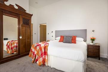 The master bedroom has an eclectic mix for furniture (Bedroom 1).