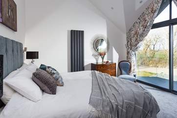 Enjoy watching swallows swooping outside your bedroom.