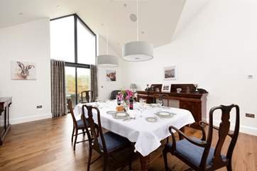 Enjoy a group meal around the table.