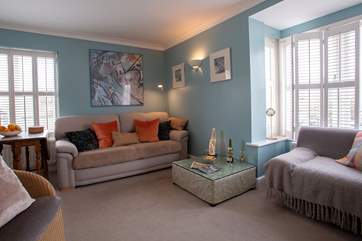 A contemporary feel in the light and relaxing living-room.