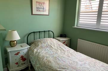 The small single bedroom on the ground floor adds flexibility for mixed groups.