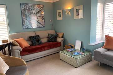 A contemporary feel in the light and relaxing living-room.