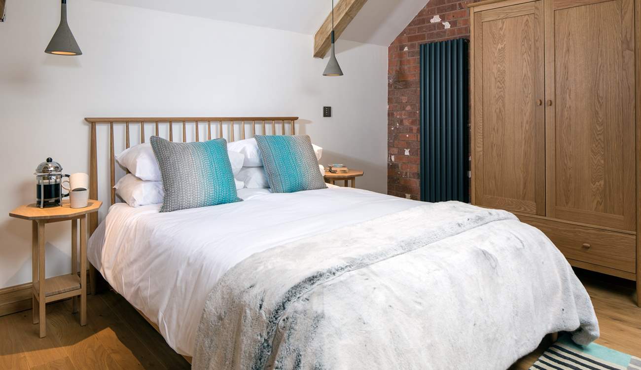 Bedroom 3 boasts this super inviting king-size bed.