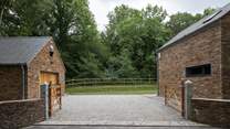 Swing into the gated driveway and prepare to be wowed.