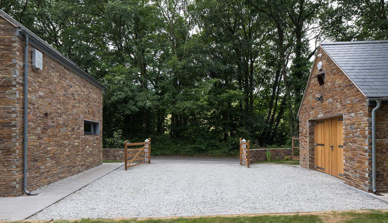 There is plenty of space to safely park 4 plus cars.