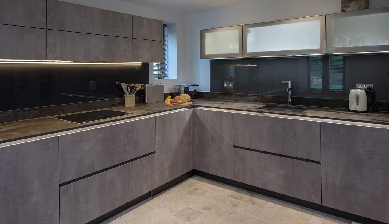 This beautiful kitchen is wonderfully equipped, offering everything you could possibly need to whip up that special meal.