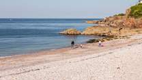 The beach at Brixham is a lovely place to spend time.