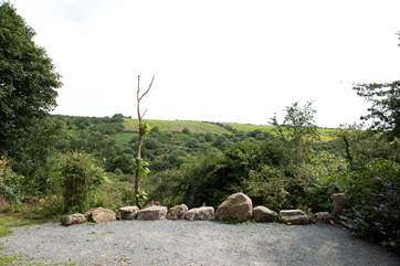 This is the view from the parking area for one of the owners' other properties - a nice stopping point to enjoy the view - including an Indian tree which the owner saved from a digger accident! - on the way to explore the grounds and woodland paths.