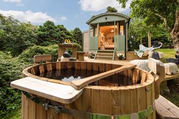 There is a charming wood-fired hot tub - perfect for stargazing from.