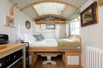 The bed cleverly converts with ease from the dining area.