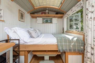 The bed cleverly converts with ease from the dining area.