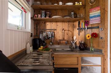 The kitchen area is well-equipped with all you could need to cook up a scrummy supper.