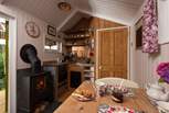 There's a small but perfectly formed kitchen as well as a dining area.