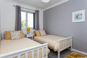 Bedroom 2 has twin beds.