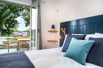 Bi-fold doors lead out to the garden.