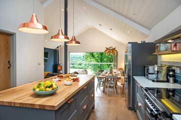 The dining and living space is set a little lower than the kitchen-area.