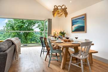 Plenty of room for all to gather around the dining-table.