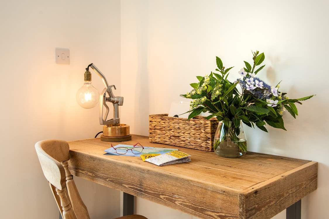 There's even a desk if you need to do any work or perhaps write your next novel