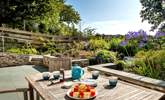 Enjoy al fresco dining in the pretty garden with the countryside setting providing the most glorious backdrop. - Thumbnail Image