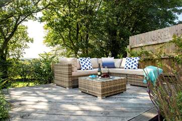 The lounge seating-area on the decking, the perfect spot to fire up the barbecue.